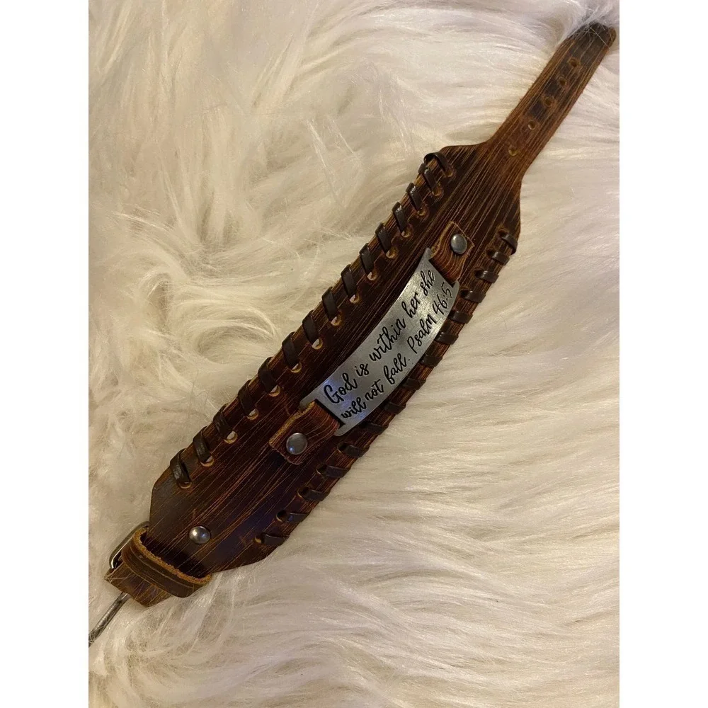 Leather wrist band Engraved verse. ‘God is with her she will not fall.’Psalm46:5